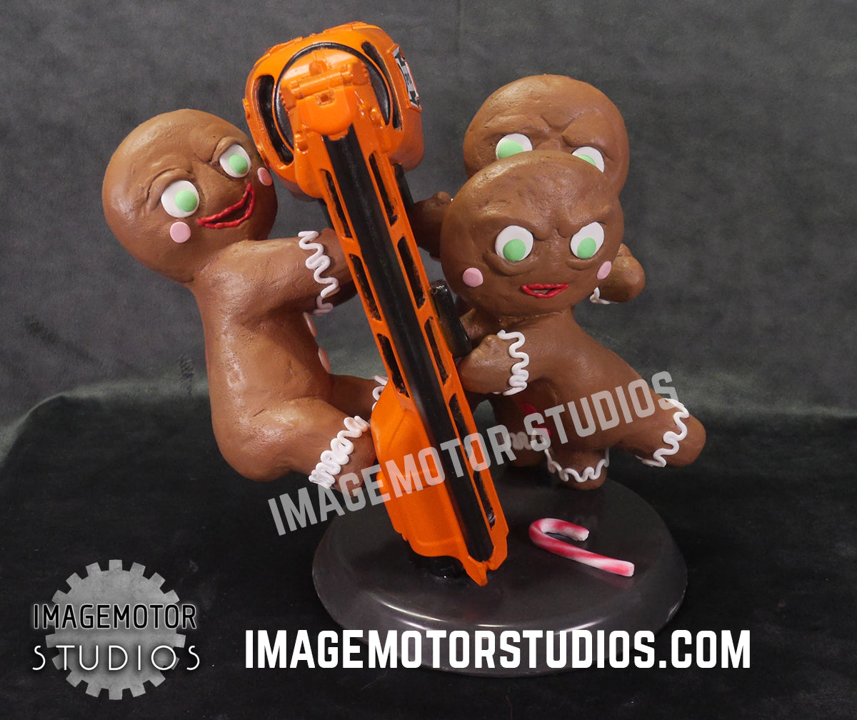 Killer Gingerbread Men with Nail Gun figurine statue